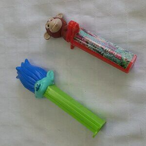 One vintage ROCKETS dispenser & one new Pez dispenser